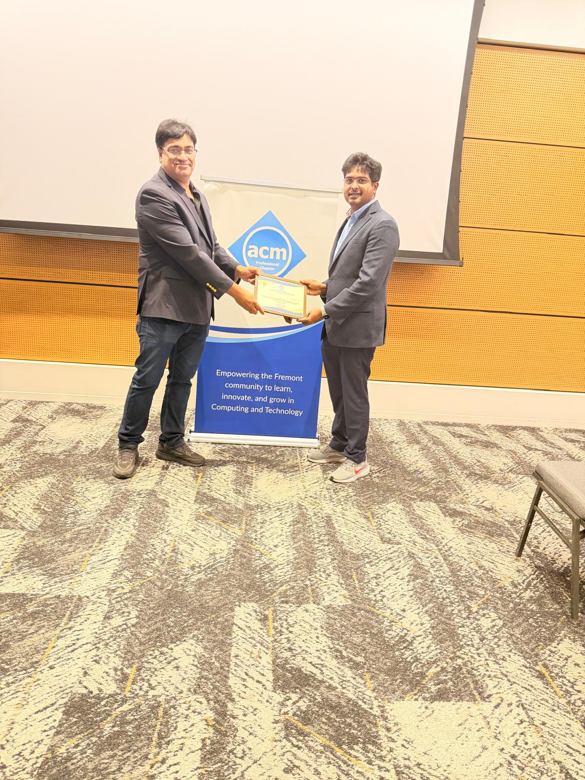 Siva Bayyavarapu receiving a certificate at the ACM Fremont Professional Chapter